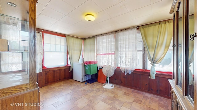 6 N Melrose Ave, Elgin, IL 60123 - sunroom featuring wood walls and stone finish floors