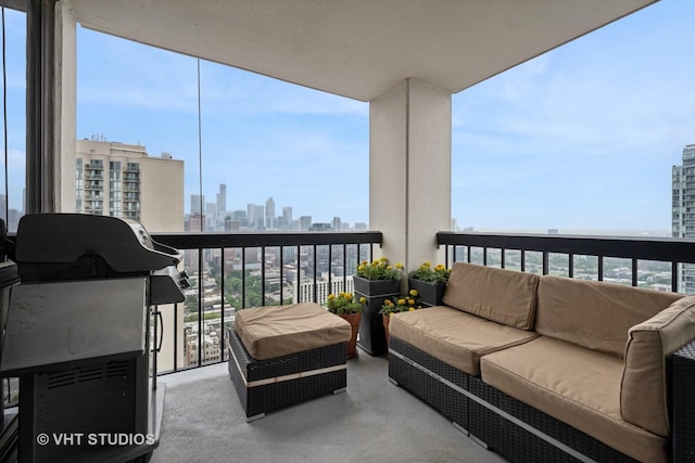 1122 N Clark St Unit 3301-10, Chicago, IL 60610 - balcony featuring a skyline view and an outdoor living space
