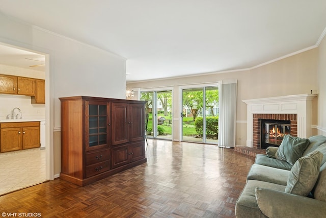 708 Newgate Ln Unit A, Prospect Heights, IL 60070 - living room with a fireplace, crown molding, and baseboards