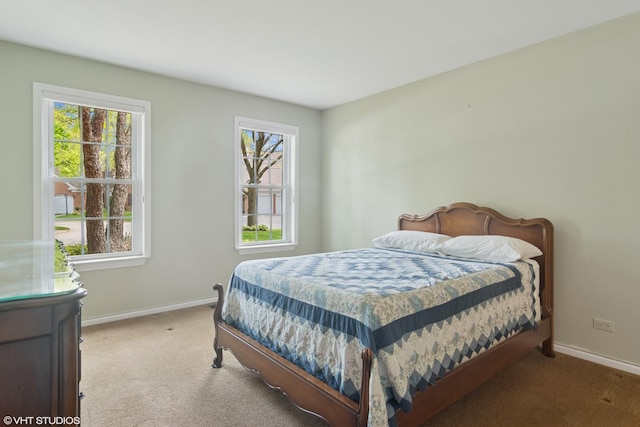 708 Newgate Ln Unit A, Prospect Heights, IL 60070 - carpeted bedroom featuring baseboards