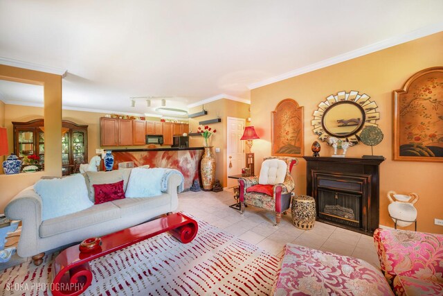 2253 Concord Dr, Mchenry, IL 60050 - living area with light tile patterned flooring, crown molding, and a fireplace