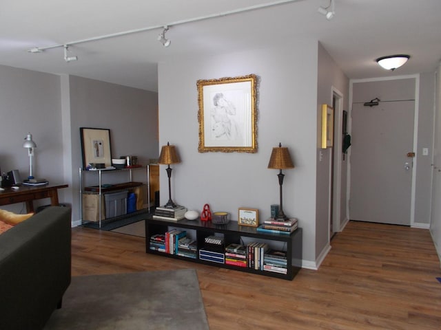 5455 N Sheridan Rd Unit 408, Chicago, IL 60640 - hall with rail lighting, wood finished floors, and baseboards