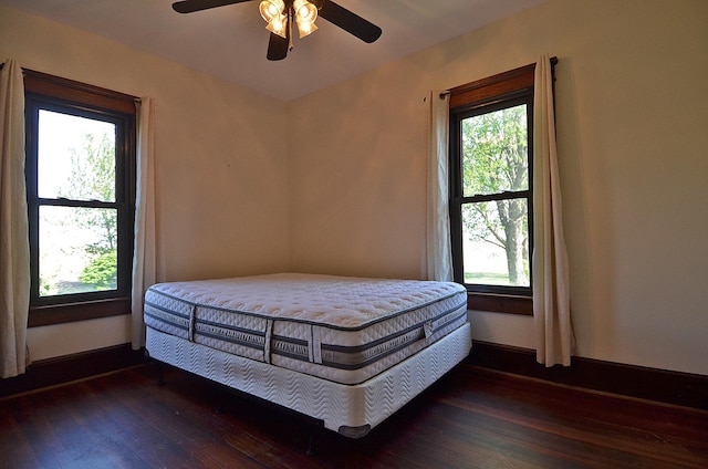 2573 State Route 17th Hwy, Toluca, IL 61369 - bedroom featuring multiple windows, wood finished floors, and ceiling fan