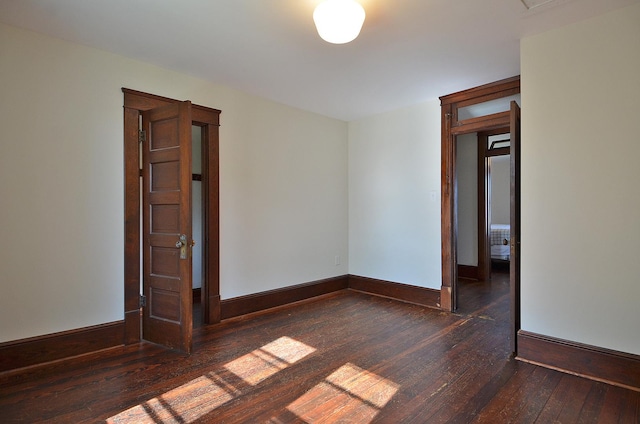 2573 State Route 17th Hwy, Toluca, IL 61369 - spare room with dark wood finished floors and baseboards