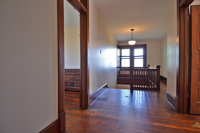 2573 State Route 17th Hwy, Toluca, IL 61369 - hall with an upstairs landing and dark wood finished floors