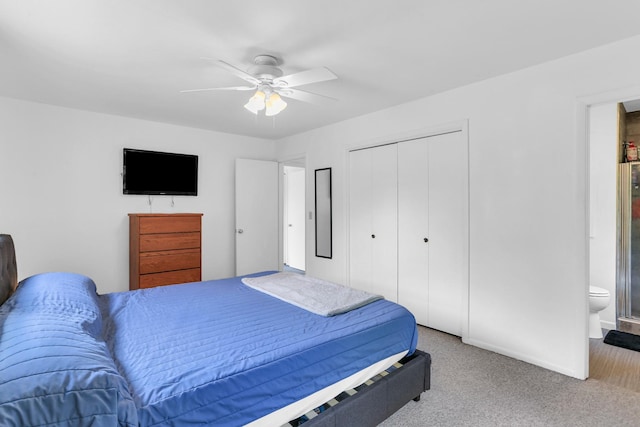 carpeted bedroom featuring a closet, a ceiling fan, and baseboards