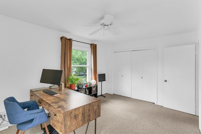 office featuring ceiling fan and carpet