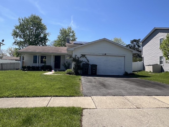 4190 Crimson Dr, Hoffman Estates, IL 60192 - single story home with solar panels, asphalt driveway, and an attached garage