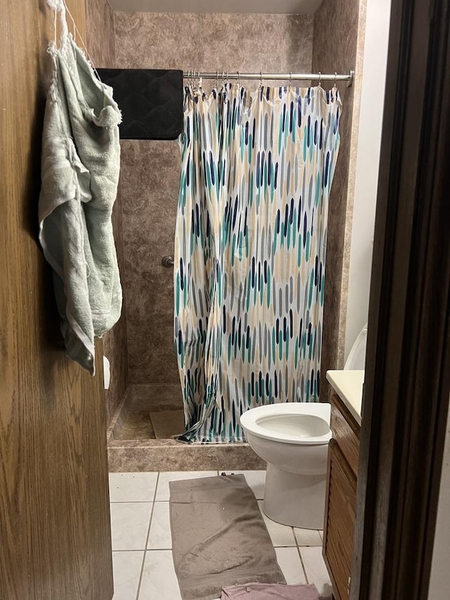 4190 Crimson Dr, Hoffman Estates, IL 60192 - full bath featuring a stall shower, tile patterned flooring, toilet, and vanity