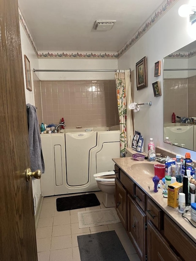 4190 Crimson Dr, Hoffman Estates, IL 60192 - full bath with a bath, toilet, vanity, tile patterned flooring, and a shower with curtain