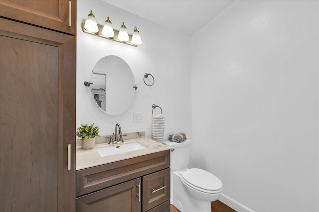 3408 E University Ave, Urbana, IL 61802 - bathroom with vanity and toilet