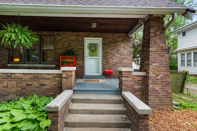 711 W Iowa St, Urbana, IL 61801 - property entrance featuring roof with shingles