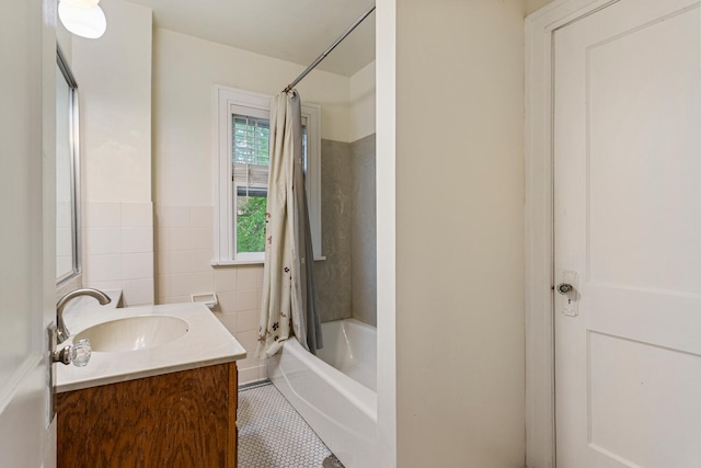 711 W Iowa St, Urbana, IL 61801 - bathroom featuring shower / tub combo, vanity, and tile patterned flooring
