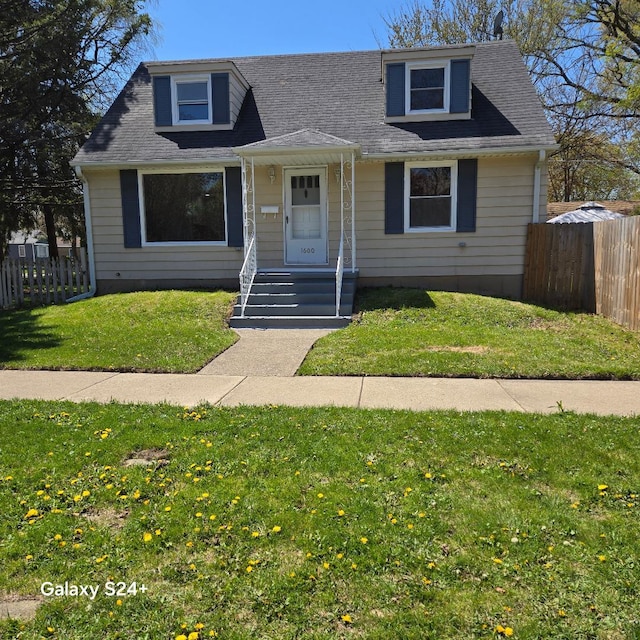 bungalow with a shingled roof