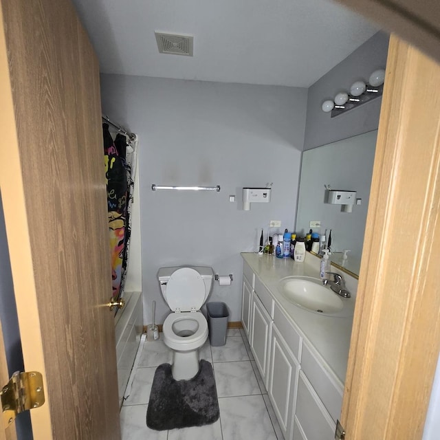 full bath featuring toilet, vanity, tile patterned floors, and shower / bath combination with curtain