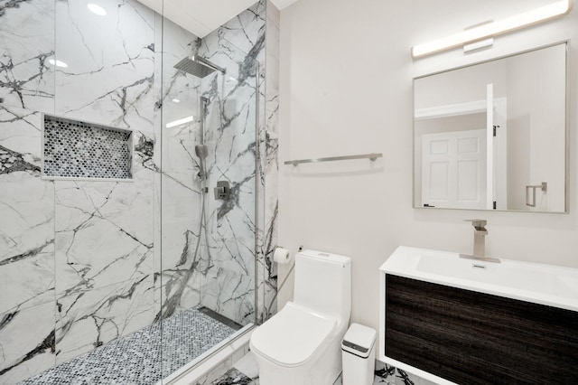 full bath featuring toilet, a marble finish shower, and vanity