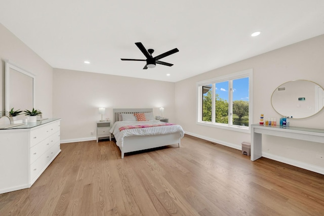 bedroom with light wood-type flooring, baseboards, ceiling fan, and recessed lighting