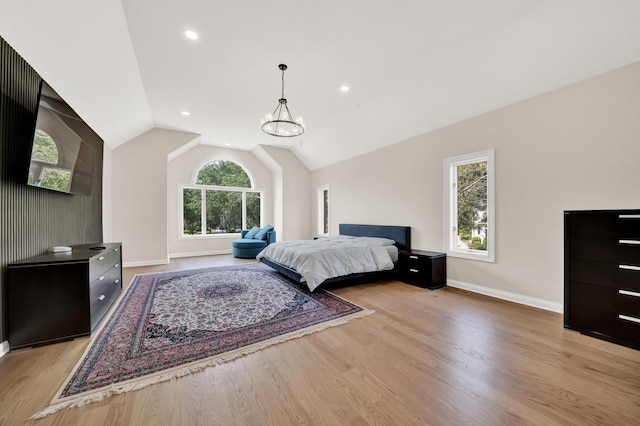 bedroom with light wood finished floors, baseboards, lofted ceiling, a chandelier, and recessed lighting