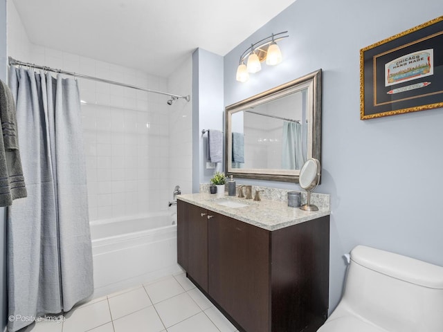 bathroom featuring tile patterned flooring, vanity, toilet, and shower / tub combo