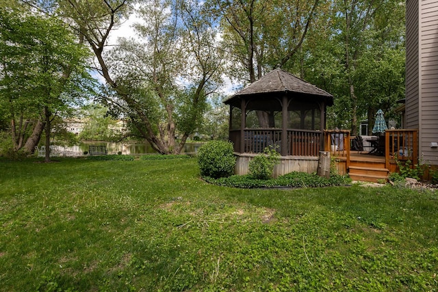 7038 Bentley Dr, Gurnee, IL 60031 - view of green lawn with a gazebo and a deck
