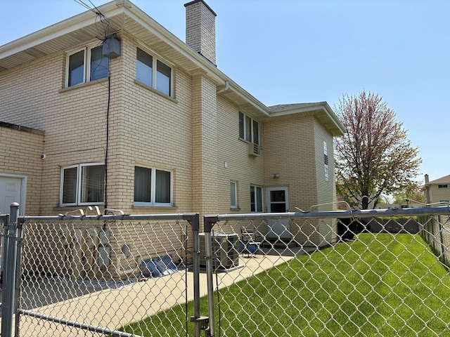 5600 Saint Charles Rd, Berkeley, IL 60163 - back of property with a chimney and central AC