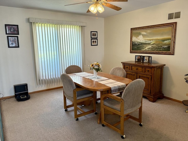 5600 Saint Charles Rd, Berkeley, IL 60163 - dining space with a ceiling fan, light carpet, and baseboards