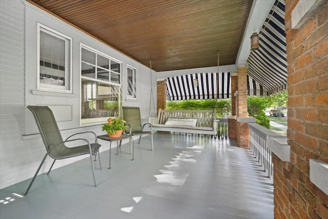 view of patio / terrace with a porch