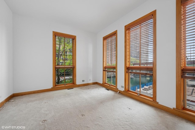 456 E N Water St Unit H, Chicago, IL 60611 - empty room with carpet flooring and baseboards