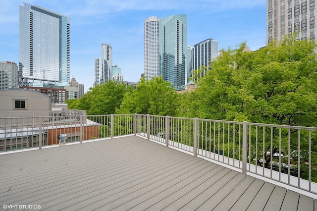 456 E N Water St Unit H, Chicago, IL 60611 - wooden terrace featuring a skyline view