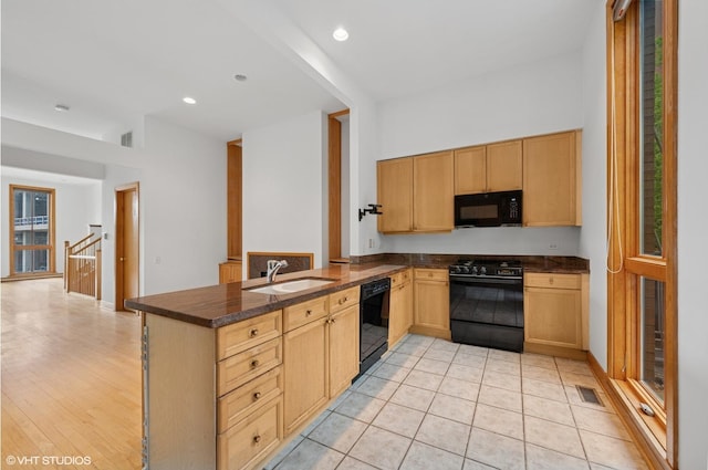 456 E N Water St Unit H, Chicago, IL 60611 - kitchen featuring black appliances, a sink, a peninsula, recessed lighting, and light brown cabinets