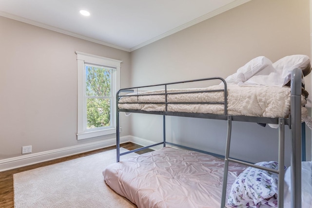 4731 E 10th Rd, Earlville, IL 60518 - bedroom featuring baseboards, wood finished floors, crown molding, and recessed lighting