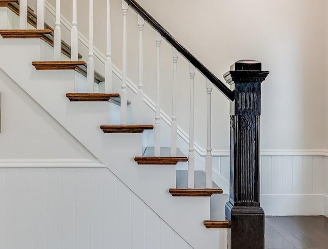 4731 E 10th Rd, Earlville, IL 60518 - staircase with a decorative wall and wainscoting