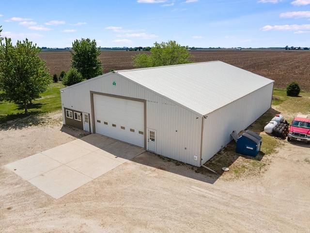 4731 E 10th Rd, Earlville, IL 60518 - detached garage featuring a rural view