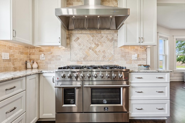 4731 E 10th Rd, Earlville, IL 60518 - kitchen featuring double oven range, wall chimney range hood, white cabinets, and light stone countertops