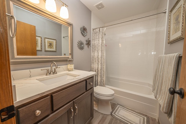 25037 W Liberty Dr, Channahon, IL 60410 - bathroom with wood finished floors, shower / bath combo, toilet, and vanity