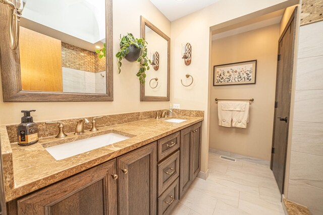 25037 W Liberty Dr, Channahon, IL 60410 - bathroom featuring double vanity and marble finish flooring
