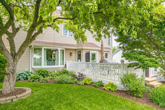 25037 W Liberty Dr, Channahon, IL 60410 - view of front of home with a wooden deck and a front lawn