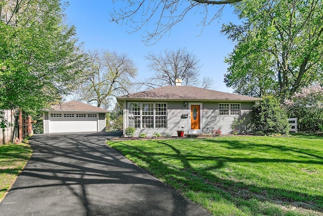 3101 Saint James St, Rolling Meadows, IL 60008 - view of front of home with a detached garage, an outbuilding, and a chimney