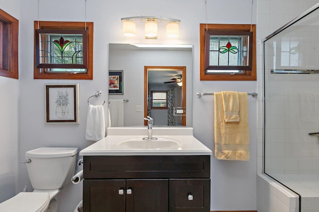 3101 Saint James St, Rolling Meadows, IL 60008 - bathroom with a ceiling fan, a tile shower, toilet, and vanity