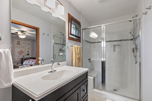 3101 Saint James St, Rolling Meadows, IL 60008 - ensuite bathroom with a shower stall, vanity, and ceiling fan