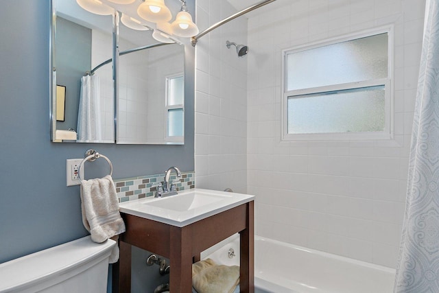 3101 Saint James St, Rolling Meadows, IL 60008 - bathroom featuring decorative backsplash, shower / bath combo, toilet, and vanity