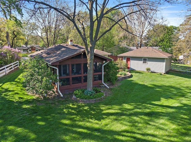 3101 Saint James St, Rolling Meadows, IL 60008 - rear view of house with a chimney, a sunroom, and an outbuilding