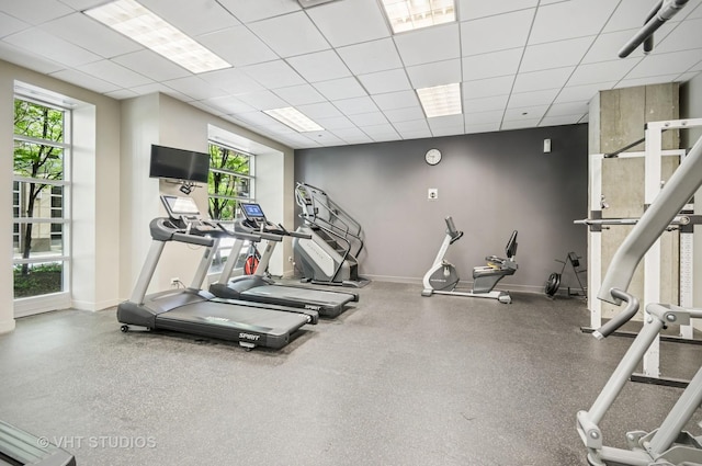 700 N Larrabee St Unit 905, Chicago, IL 60654 - workout area with healthy amount of natural light, baseboards, and a paneled ceiling