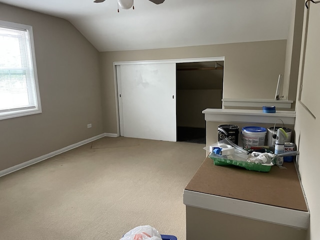768 S Spring Rd, Elmhurst, IL 60126 - unfurnished bedroom featuring vaulted ceiling, light carpet, ceiling fan, and a closet