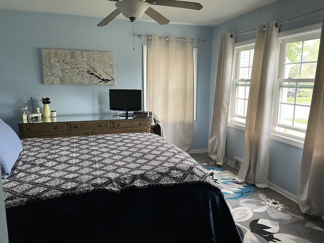 768 S Spring Rd, Elmhurst, IL 60126 - carpeted bedroom featuring baseboards and ceiling fan