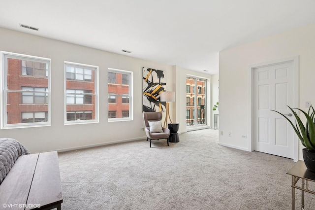 501 N Kingsbury St Unit G, Chicago, IL 60654 - living area featuring carpet, plenty of natural light, and baseboards