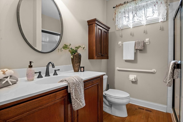 1021 Fire Fox Ct, Saint Charles, IL 60174 - full bathroom with vanity, toilet, an enclosed shower, and baseboards