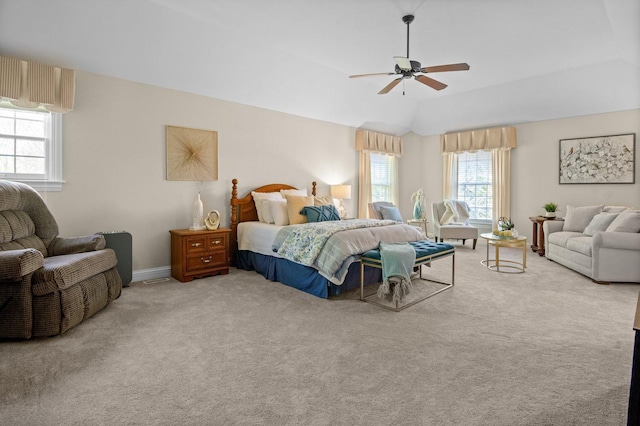 1021 Fire Fox Ct, Saint Charles, IL 60174 - carpeted bedroom featuring multiple windows, vaulted ceiling, ceiling fan, and baseboards