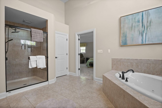 1021 Fire Fox Ct, Saint Charles, IL 60174 - full bath with a shower stall, a jetted tub, tile patterned floors, baseboards, and connected bathroom