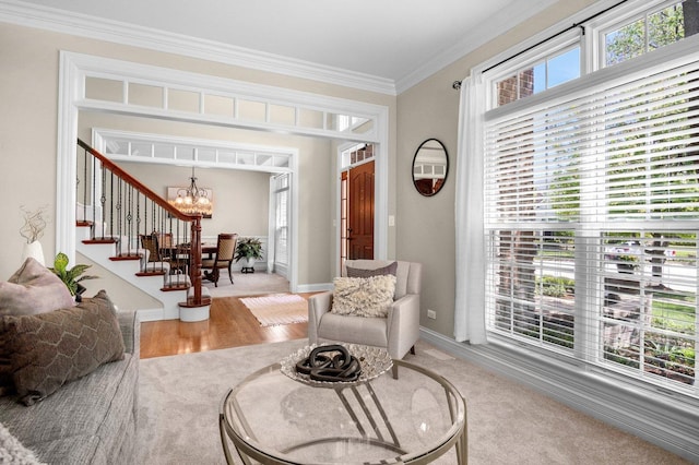 1021 Fire Fox Ct, Saint Charles, IL 60174 - sitting room featuring a chandelier, stairway, ornamental molding, and baseboards